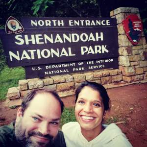 Maggie and Abe in front of Shenandoah National Park North Entrance sign